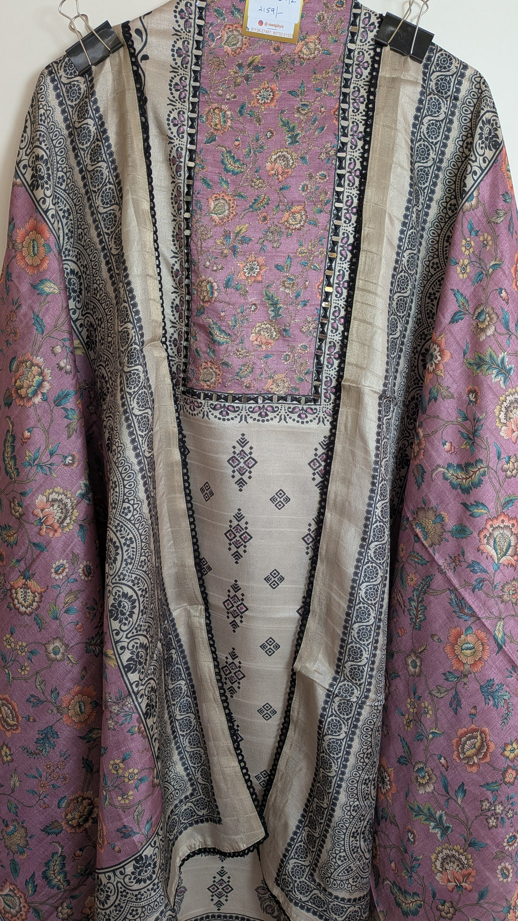 Traditional garment with intricate patterns on a plain background