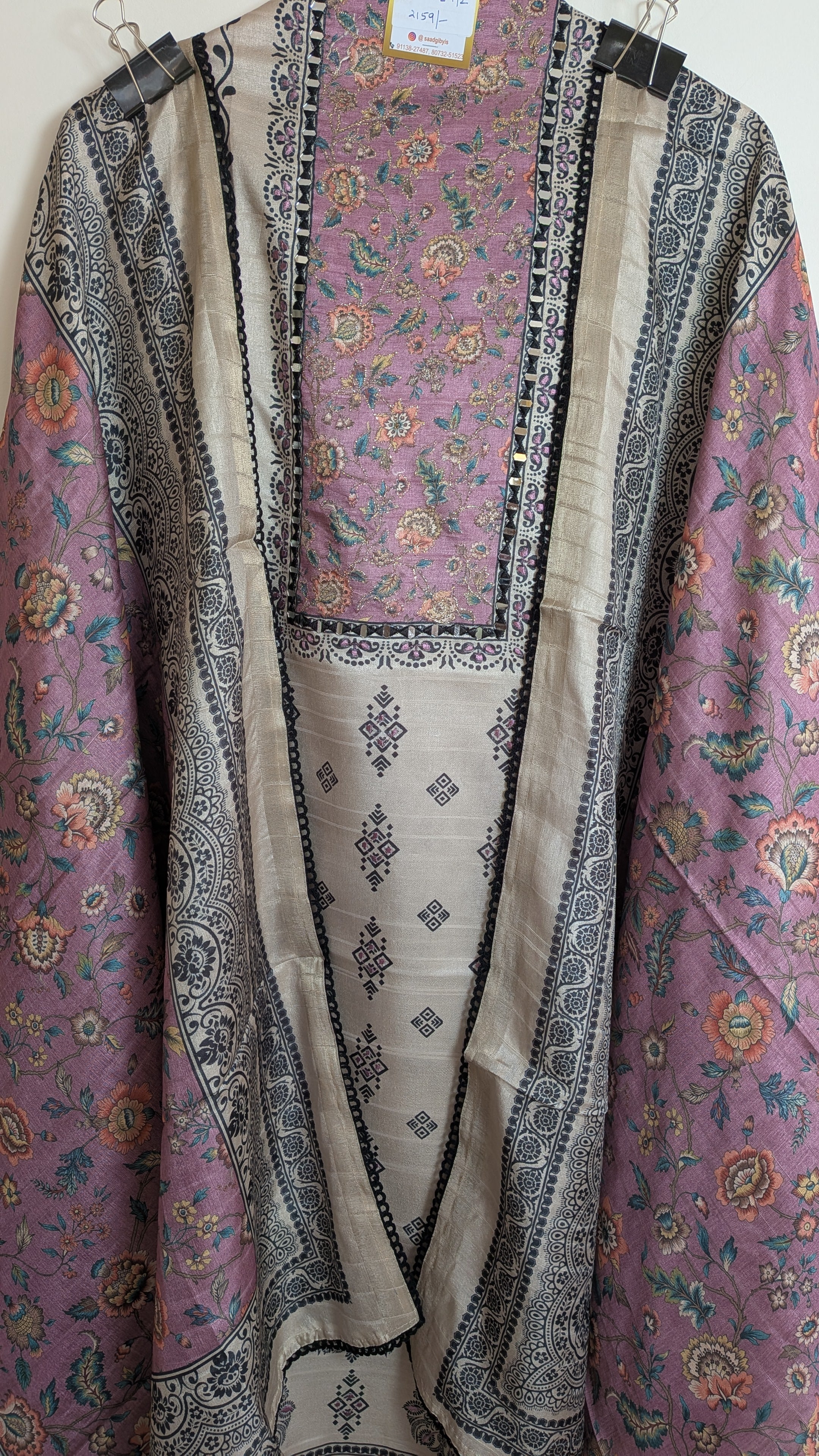 Traditional garment with intricate patterns on a plain background